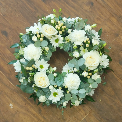 Classic Wreath in White - Classic white wreath order online for funerals delivered in Whitley Bay and the surrounding areas by The Garden Shop Florist.