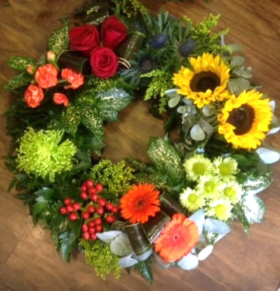Grouped Wreath - Bespoke funeral tributes hand made by The Garden Shop Florist in Whitley Bay. Order online today