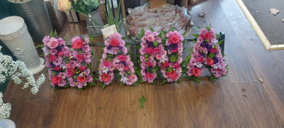 Open style Letter tribute - Order funeral letter tributes, bespoke hand made by The Garden Shop Florist. Order online today for delivery In Whitley Bay and surrounding areas.