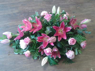 Pink Rose and Lily Spray - Rose and lily funeral tribute hand made in Whitley Bay by The Garden Shop Florist. Order on line today for flower delivery Whitley Bay