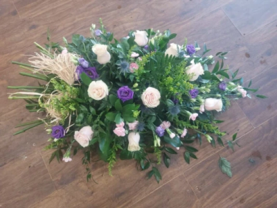 Pastel woodland spray - Funeral flowers delivered in Whitley Bay by The Garden Shop Florist. Order online today