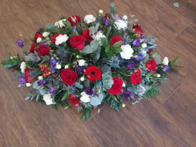 Teardrop Spray - Order red white and blue funeral flowers today online for flower delivery in Whitley Bay by The Garden Shop Florist.