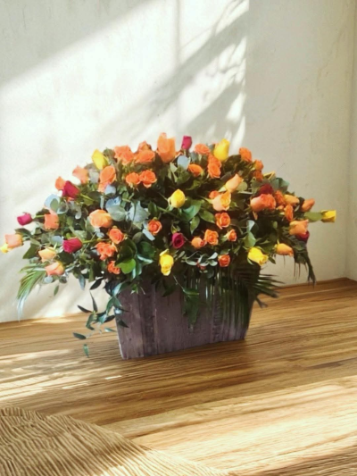 Autumnal funeral Spray - Bespoke funeral tributes hand made in Whitley Bay by The Garden Shop Florist. order online for flower delivery today.